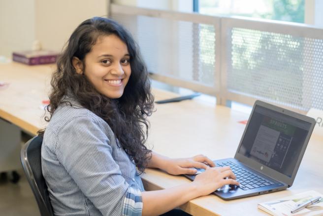 student using laptop