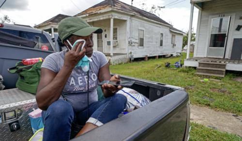  Linda Smoot, a resident of Lake Charles, Louisiana, returned from a shelter after Hurricane Laura in August to find storm damage at her niece's home. AP Photo/Gerald Herbert 