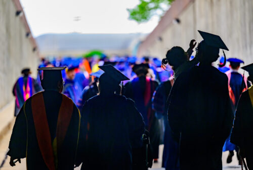 image of graduates in shadows